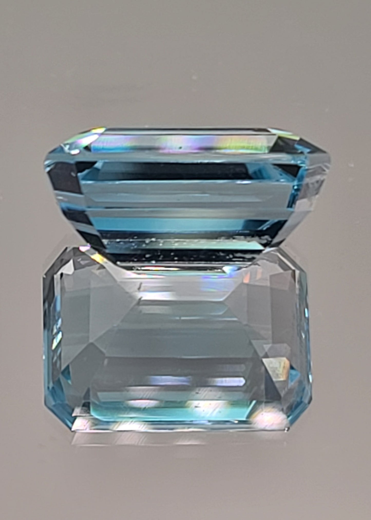 23.3ct ETW Natural Sky Blue Topaz Gemstone - Emerald Cut