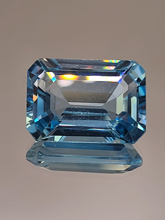 18.46ct ETW Natural Sky Blue Topaz Gemstone - Emerald Cut
