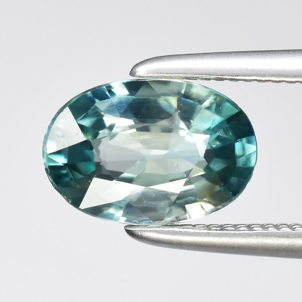 1.37ct ETW Earth-Mined Blue Green Zircon – Oval Cut, Gentle Heat