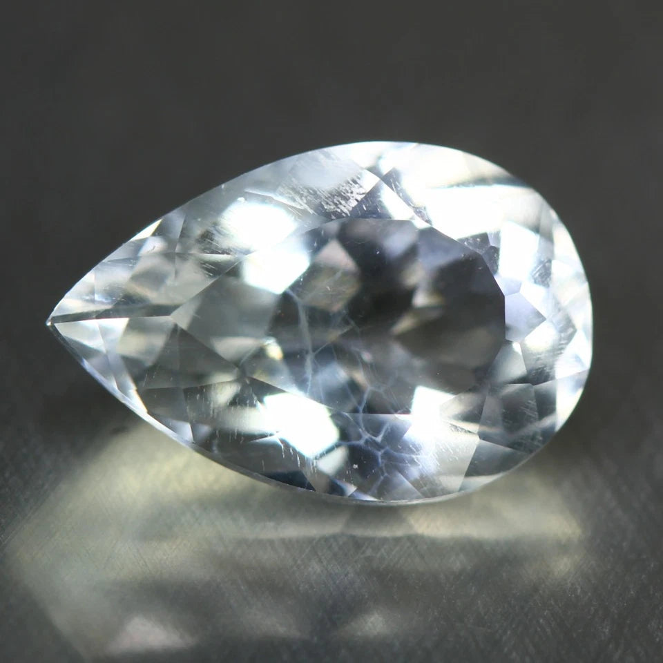 2.00ct ETW Earth-Mined Hyalite Opal – Pear Cut, UV Reactive