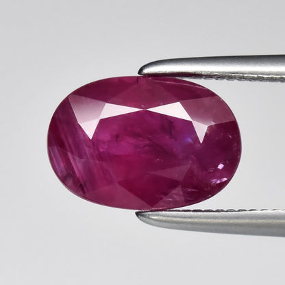 2.14ct ETW Earth-Mined Purplish Red Ruby – Oval Cut, Heated