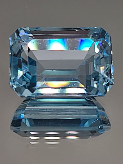 23.3ct ETW Natural Sky Blue Topaz Gemstone - Emerald Cut