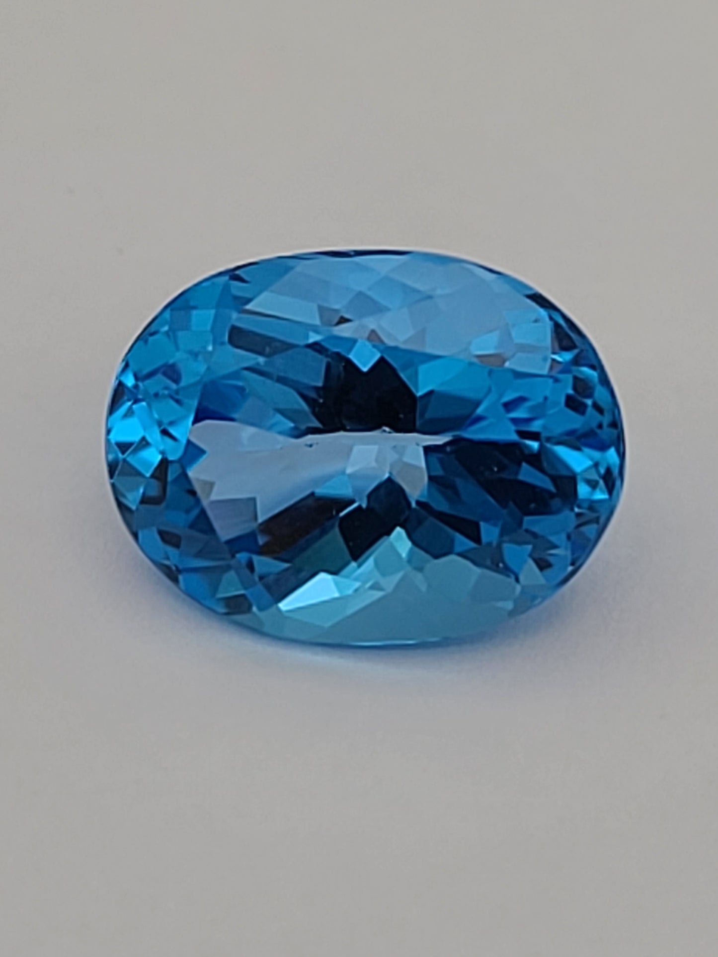 12.19ct ETW Swiss Blue Topaz Gemstone - Oval Cut