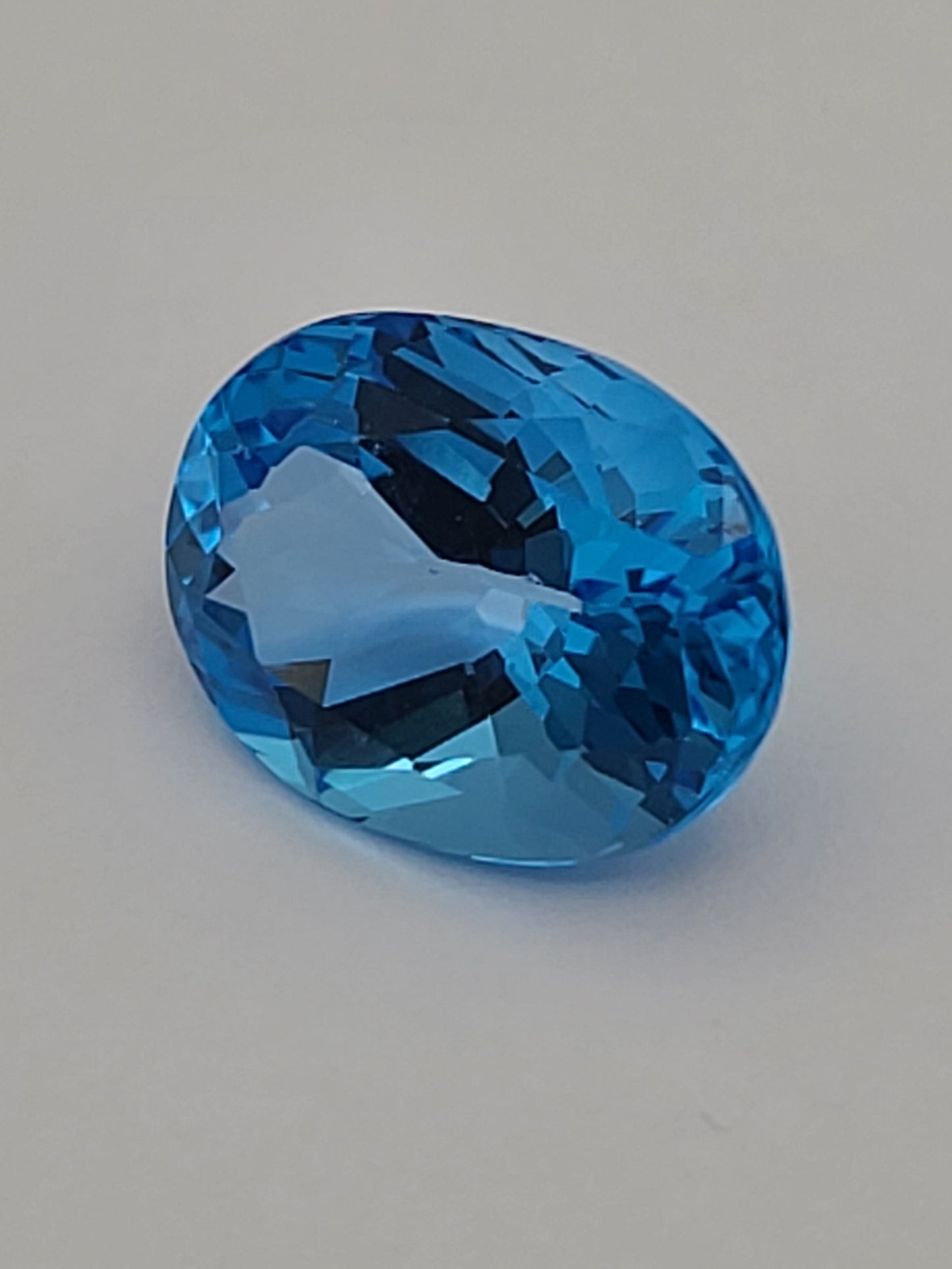 12.19ct ETW Swiss Blue Topaz Gemstone - Oval Cut