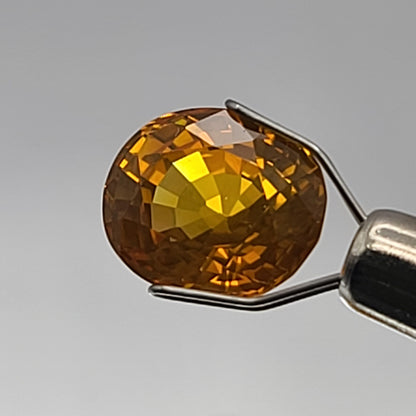 5.49ct ETW Earth-Mined Yellow Orange Sapphire – Oval Cut - GIA Gemological Report