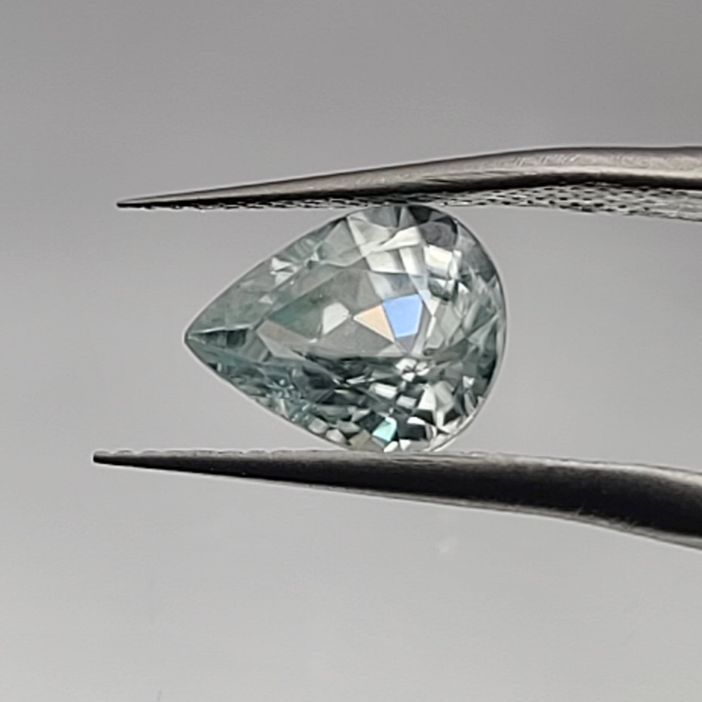 2.65ct ETW Earth-Mined Light Green Zircon – Pear Cut