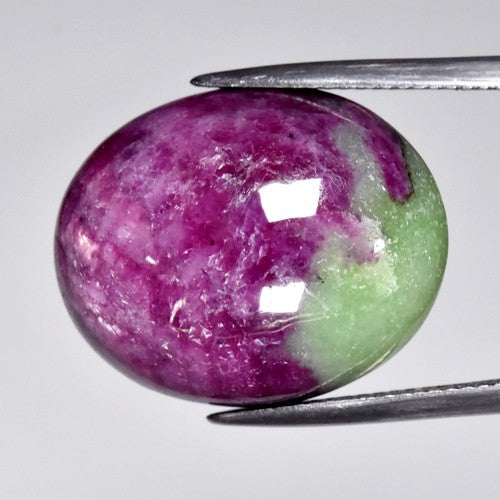 29.51ct ETW Earth-Mined Green-Purplish Red Ruby in Zoisite – Oval Cabochon, Unheated