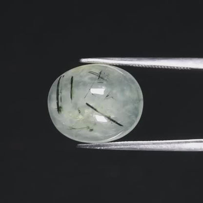 9.26ct ETW Earth-Mined Green Prehnite – Oval Cabochon, Black Needles
