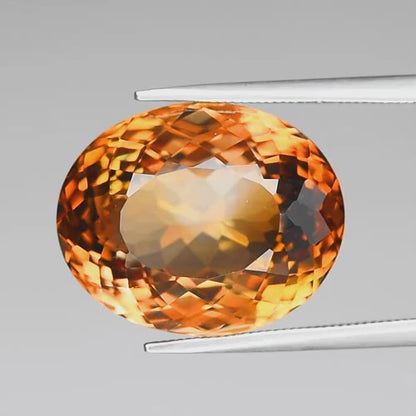 21.03ct ETW Earth-Mined Champagne Topaz – Oval Cut